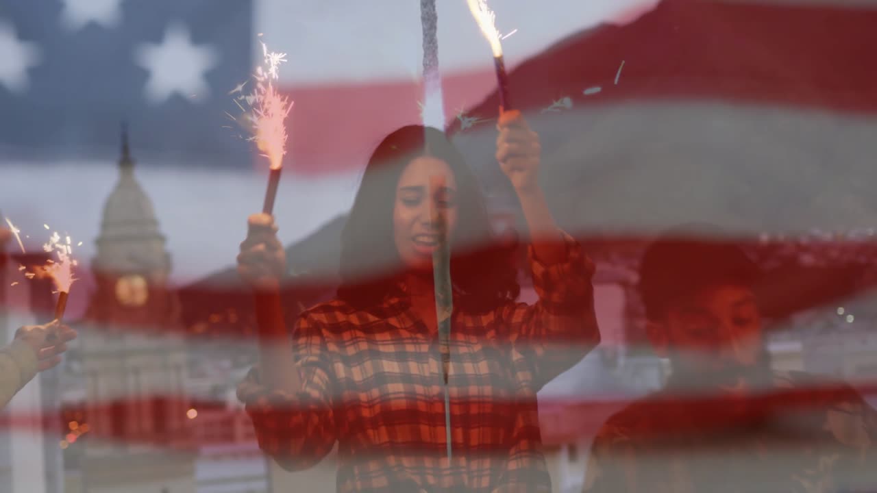 Friends igniting sparklers on rooftop terrace, dancing under waving flag overlay for marketing ads