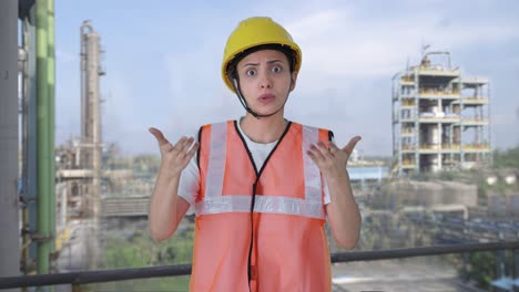 angry indian female construction worker shouting on someone