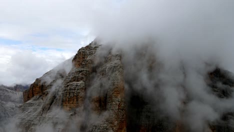 Aerial-views-of-italian-Dolomites-peaks-in-a-foggy-and-cloudy-day