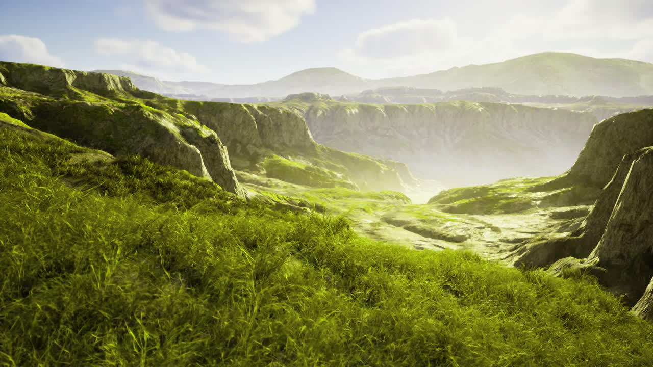 Vast green landscape with rolling hills and sunlight streaming through clouds