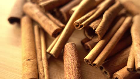 cinnamon sticks rotate as a background cinnamon closeup spices with cinnamon