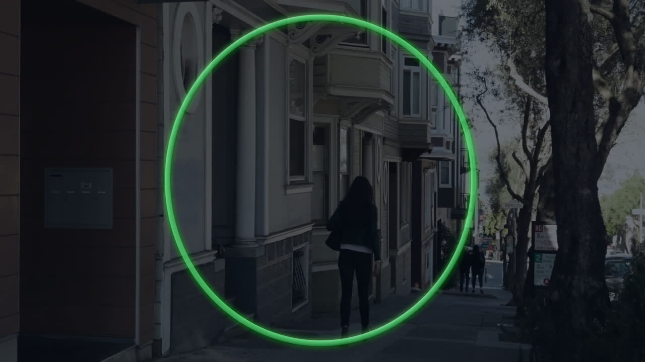 Walking on city sidewalk, person surrounded by glowing green animation circle