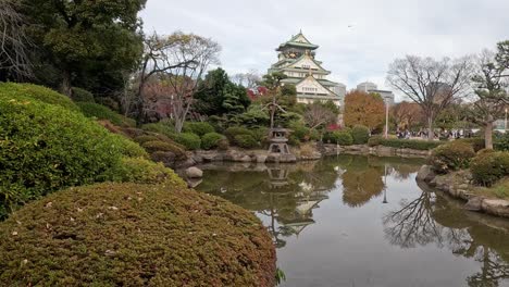 peaceful garden with pagoda and reflective pond