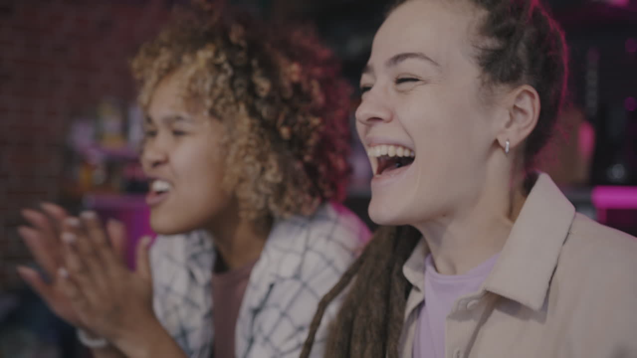 Two Friends Watching an Event