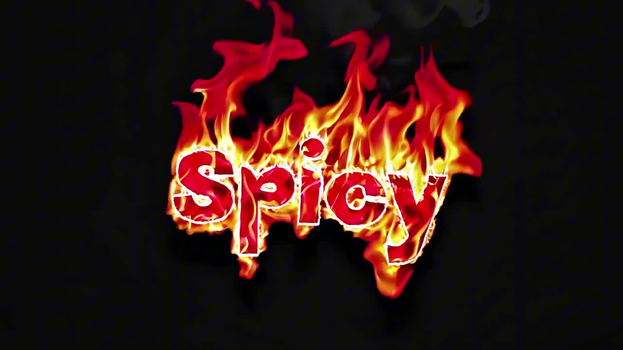 Dynamic video concept with fiery text 'Spicy' engulfed in flames. Captured from a front angle, set