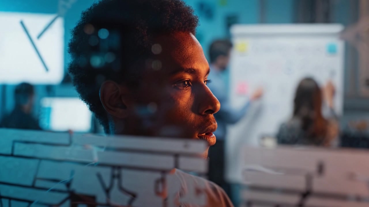 Focused Individual Deep in Thought in a Modern Workspace with Collaborative Elements and a Creative Atmosphere Enhancing Innovative Thinking and Problem Solving