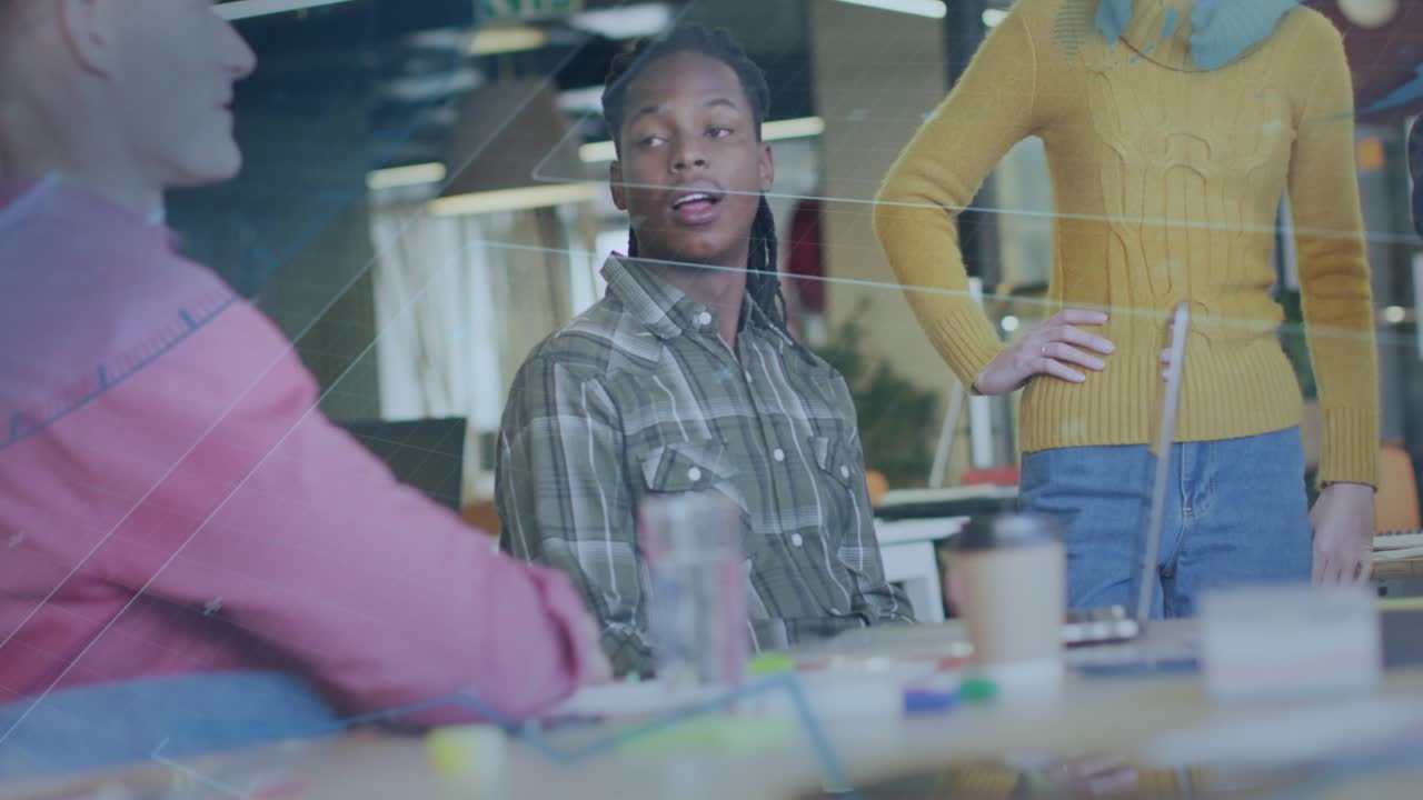 Seated speaker opening mouth and speaking, animating notes, charts over laptop, showing strategy