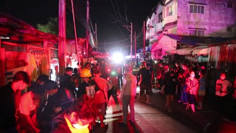 emergency crew on scene to a fire in ratchada soi 36 bangkok, thailand