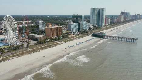 descending aerial of ocean beach shore coastline