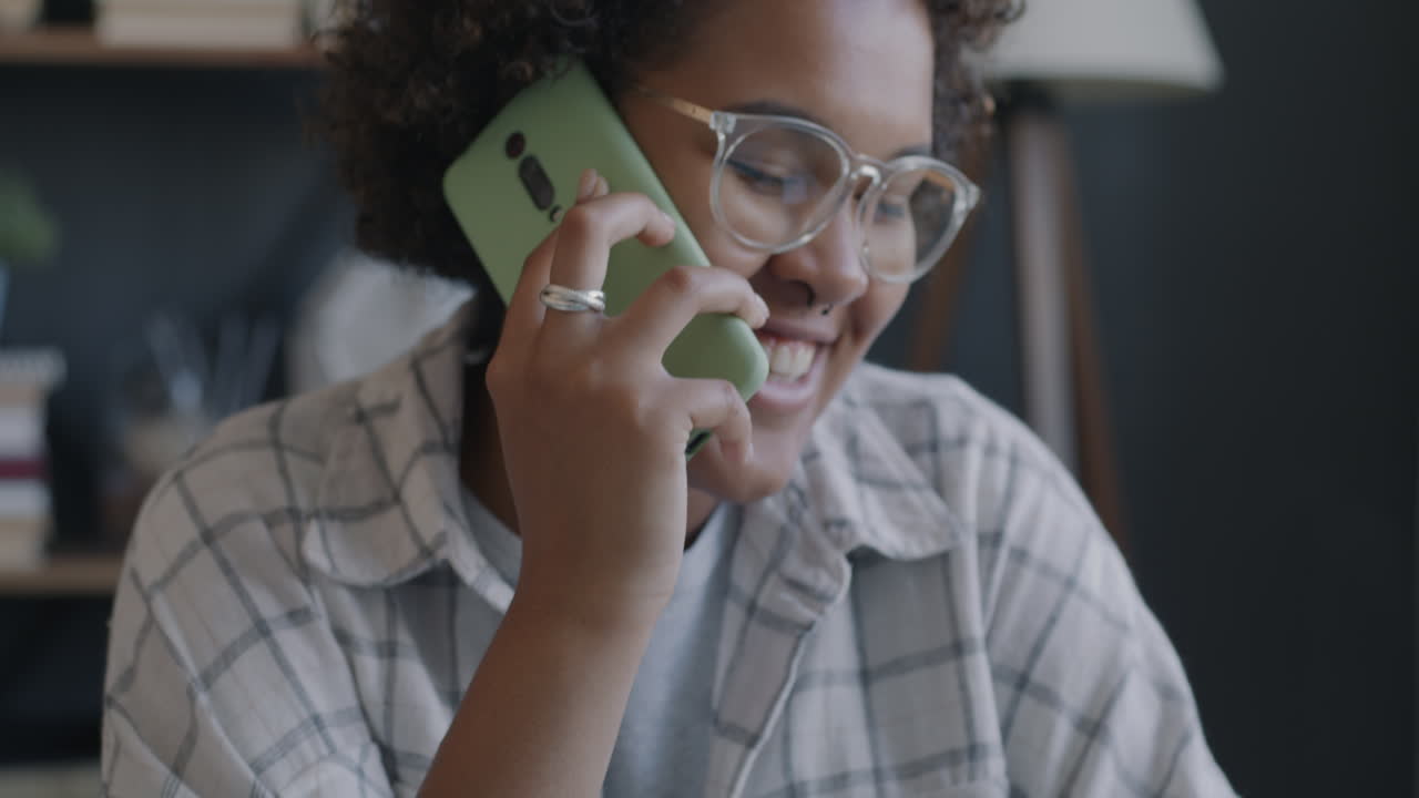 Woman Working and Talking on Phone
