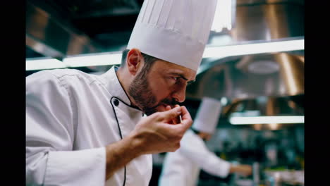 chef tasting food in a commercial kitchen