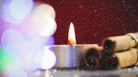 Falling-snow-with-Christmas-candle