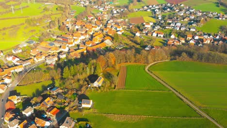 flight-over-small-village-in-the-countryside-on-a-sunny-afternoon