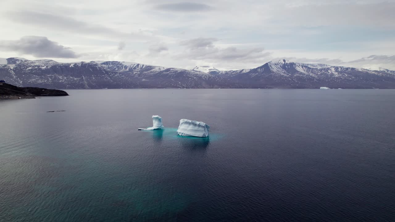 Massive Iceberg Calving in Greenlandic Fjord, Arctic Nature - Truck Shot