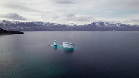 Massive Iceberg Calving in Greenlandic Fjord, Arctic Nature - Truck Shot