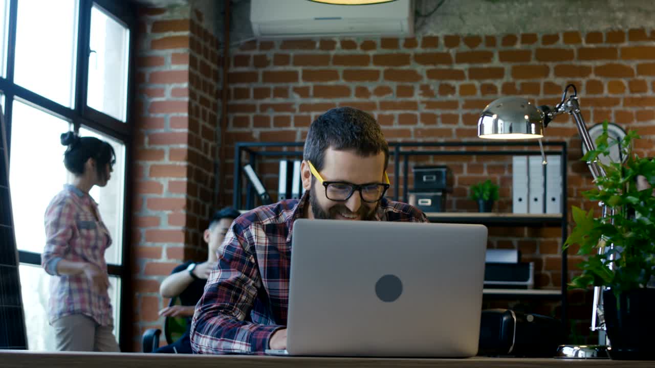 Man receiving good news in office