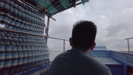 crossing water by traditional vietnamese motor boat in