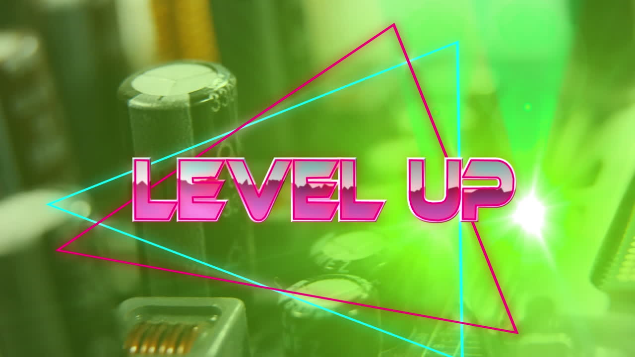 Level up text on neon triangles against close up of microprocessor connections on motherboard