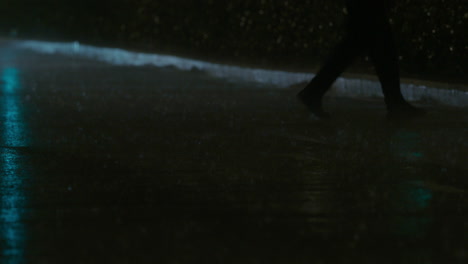 night downpour car and people traffic on the wet road
