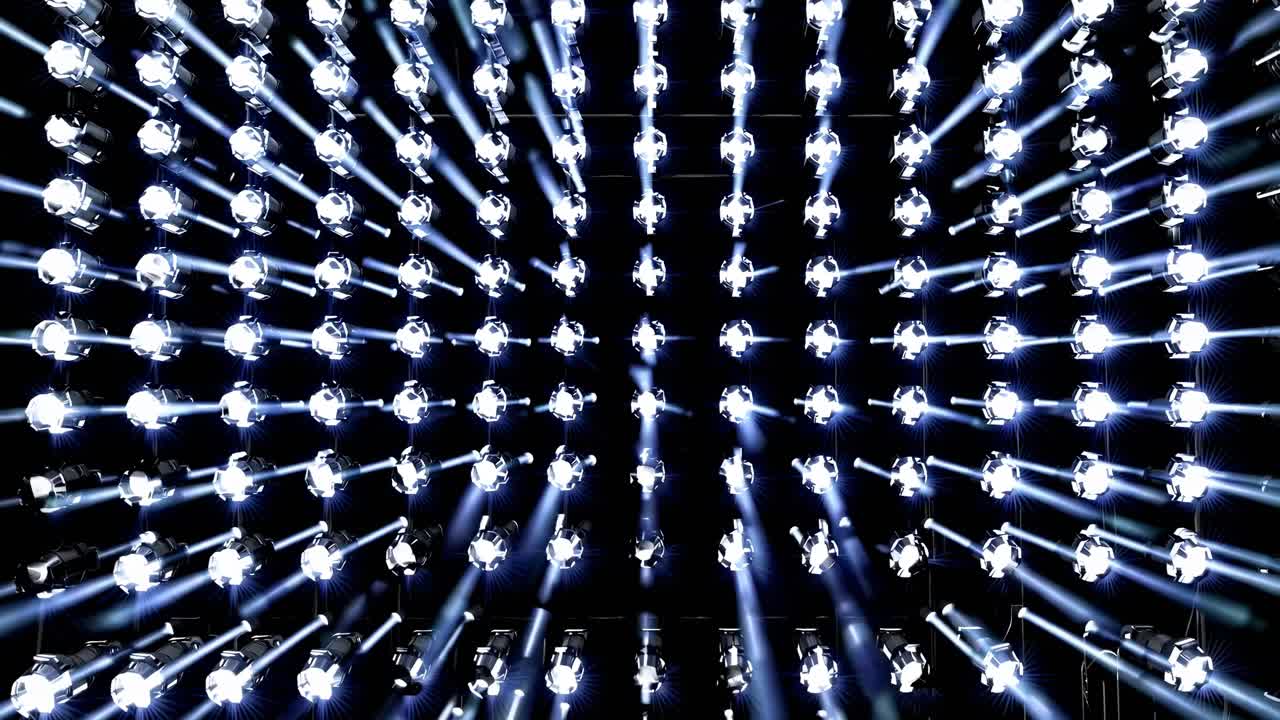 A dynamic video captures a futuristic tunnel of lights from a low-angle perspective