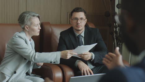 Business Team Discussing Contract