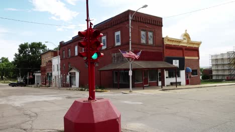 antique four way stop light in downtown toledo, iowa with stable video extreme close up at an angle