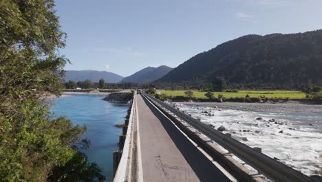 Van-crossing-one-lane-bridge-in-rural-New-Zealand