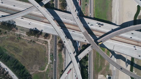 Drone-view-of-complex-highway-interchange-of-710-freeway-parallel-to-Los-Angeles-river