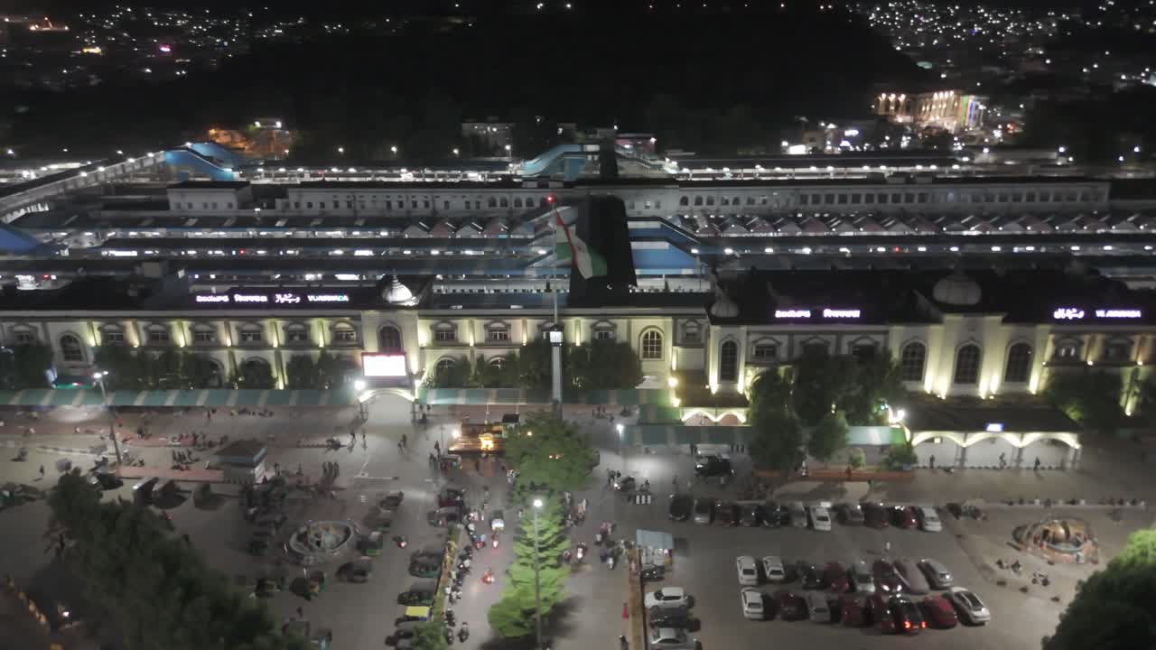 Aerial Night View of a Busy Train Station in an Indian City