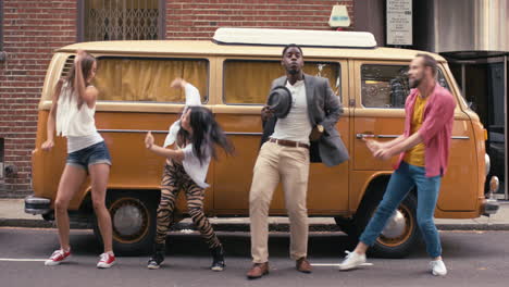 Group-of-multi-racial-dancers-street-dancing-funky-freestyle-in-the-city