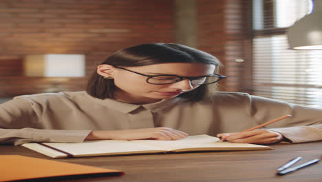 young pretty businesswoman talking on video call