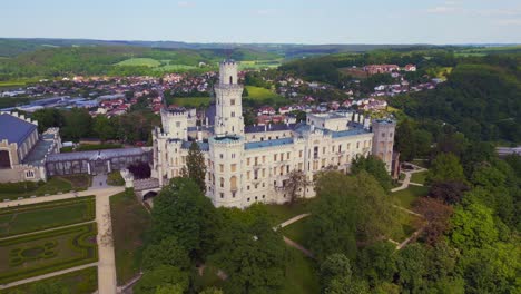 Fabulous-aerial-top-view-flight-Fairy-tale-castle-in-Czech-Republic-Europe,-summer-day-2023