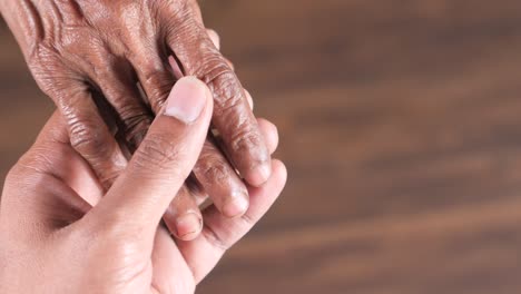 holding hands: a symbol of care and connection between generations