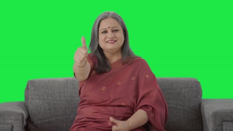 Happy-Indian-old-woman-showing-thumbs-up-Green-screen