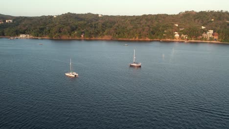 Drone-Flying-above-Coastline-alongside-with-Caribbean-sea-during-Sunset