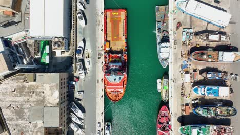 Aerial-Drone-shot-flying-slowly-with-a-top-down-view-of-ships-in-a-boat-yard