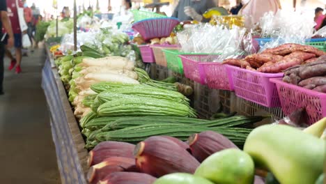 close-up footage of exotic vegetables displaying on stalls in the asian street market