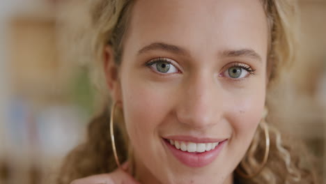 close-up-portrait-of-beautiful-young-blonde-woman-smiling-happy-running-hand-through-hair-attractive-female-student-perfect-skin-real-people-series