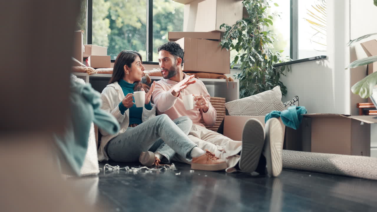 Couple Relaxing with Coffee After Moving into New Home