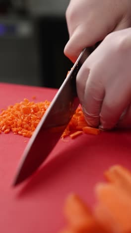 chef chopping carrots