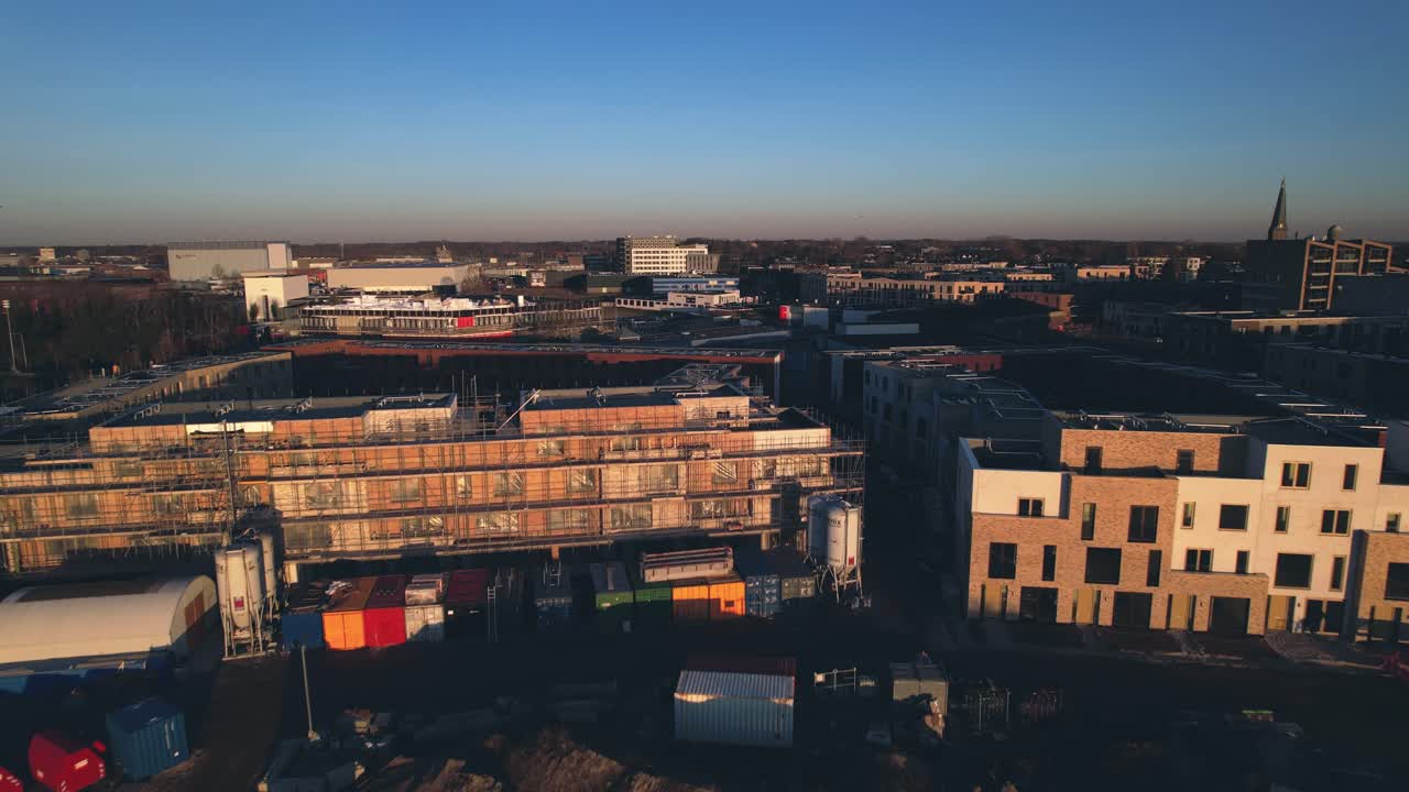 Meadow floodplains and aerial view on PUUR21 new housing construction project part of urban development in Zutphen along river IJssel