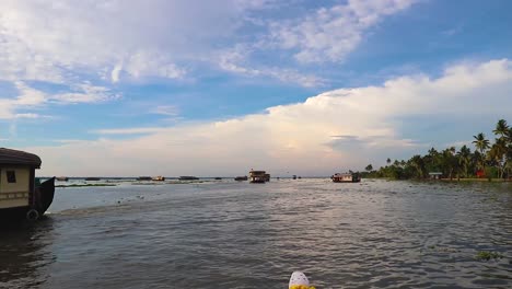 houseboats running in sea backwater with amazing sky at morning video taken at alappuzha or alleppey backwater kerala india