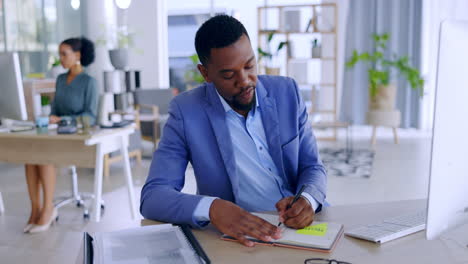 Black-man,-writing-and-book-for-research