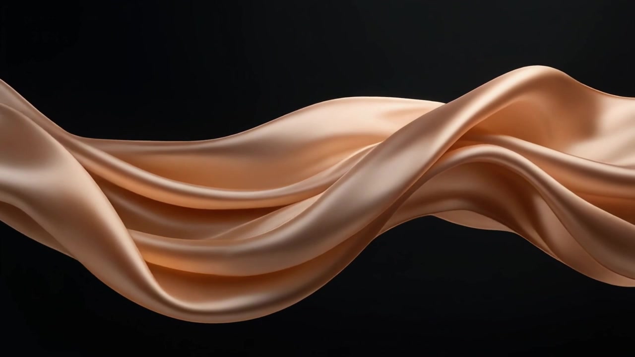 Flowing Golden Silk Fabric Waving Against Black Background