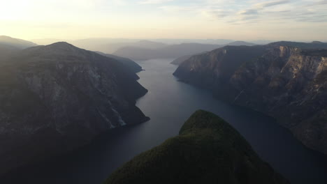 Drone-shot-flying-towards-Beitelen-and-the-point-where-the-Aurlandsfjord-and-Nærøyfjord-meets