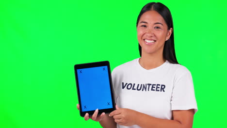 Tablet,-charity-and-a-woman-volunteer-on-green