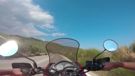 riding a motorcycle on penteli mountain in greece