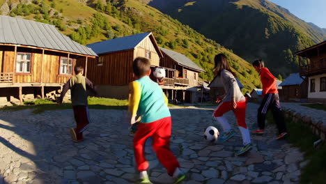 children playing football in a mountain village