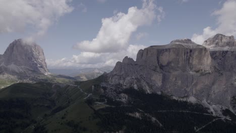 Drone-video-with-360º-plane-from-the-front-right,-over-the-horizon-of-the-complete-Sella-Pass