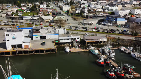 fishing vessels, charter, and yacht dock in the marina in port alberni, vancouver island, bc, canada